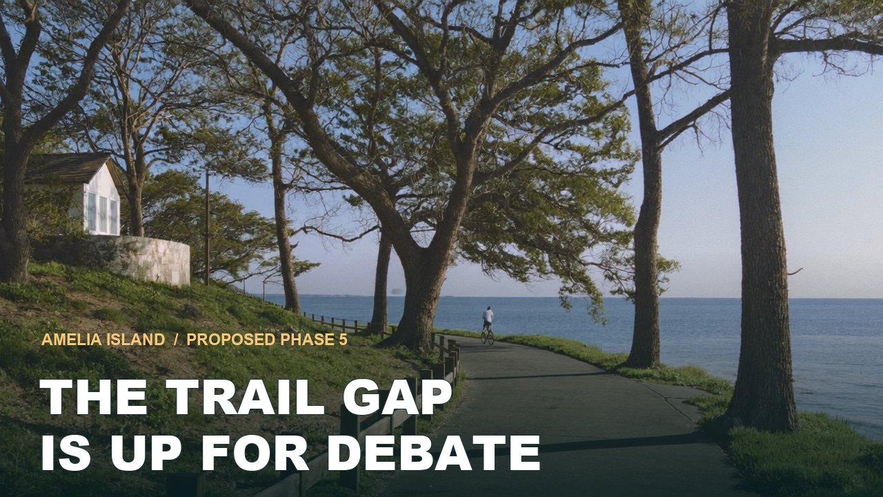 Editorial depiction of a tree-lined shared-use trail with fictional cyclists, overlaid with The trail gap is up for debate.